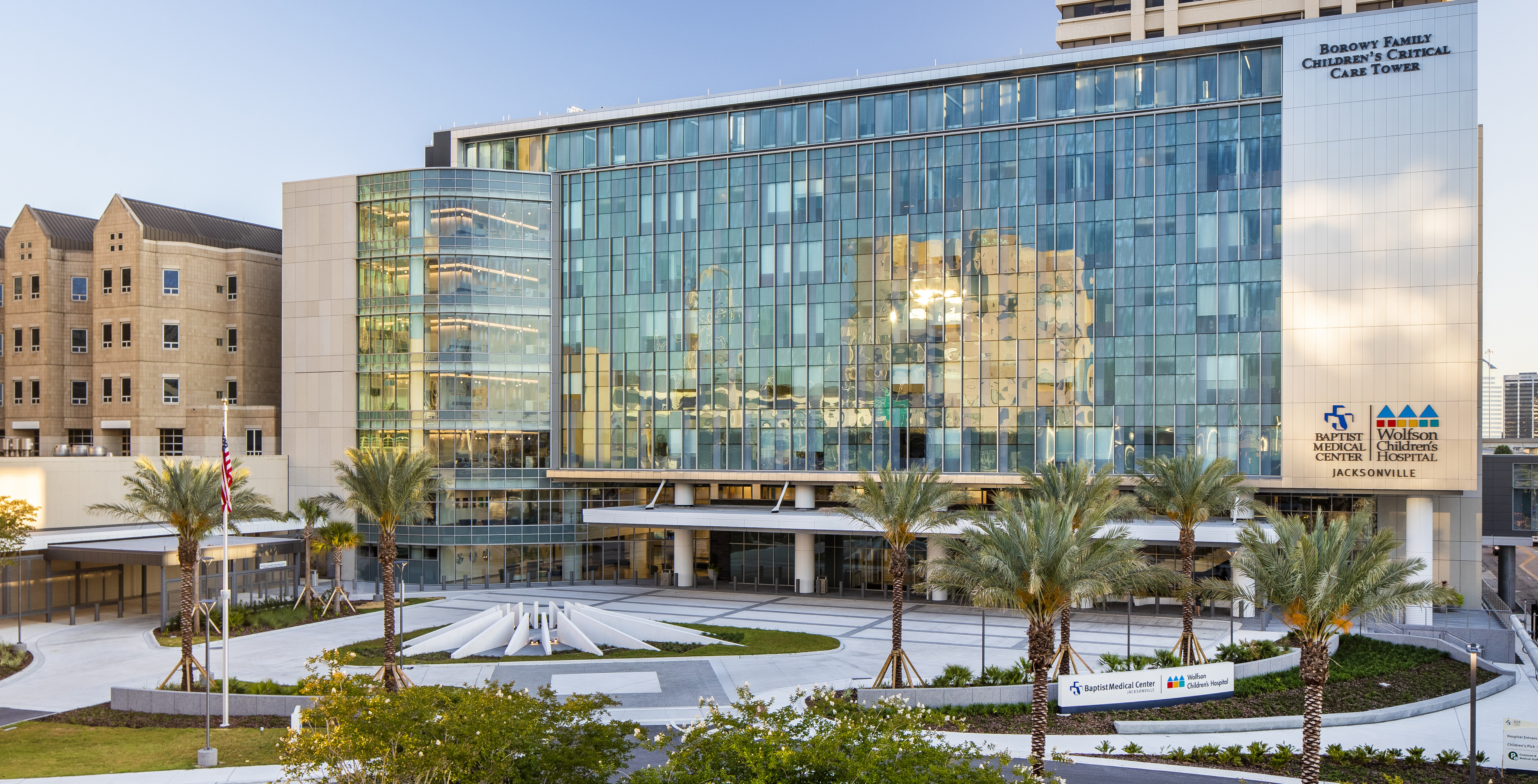 exterior photograph of the wolfson chidlren's critical care tower on a sunny day