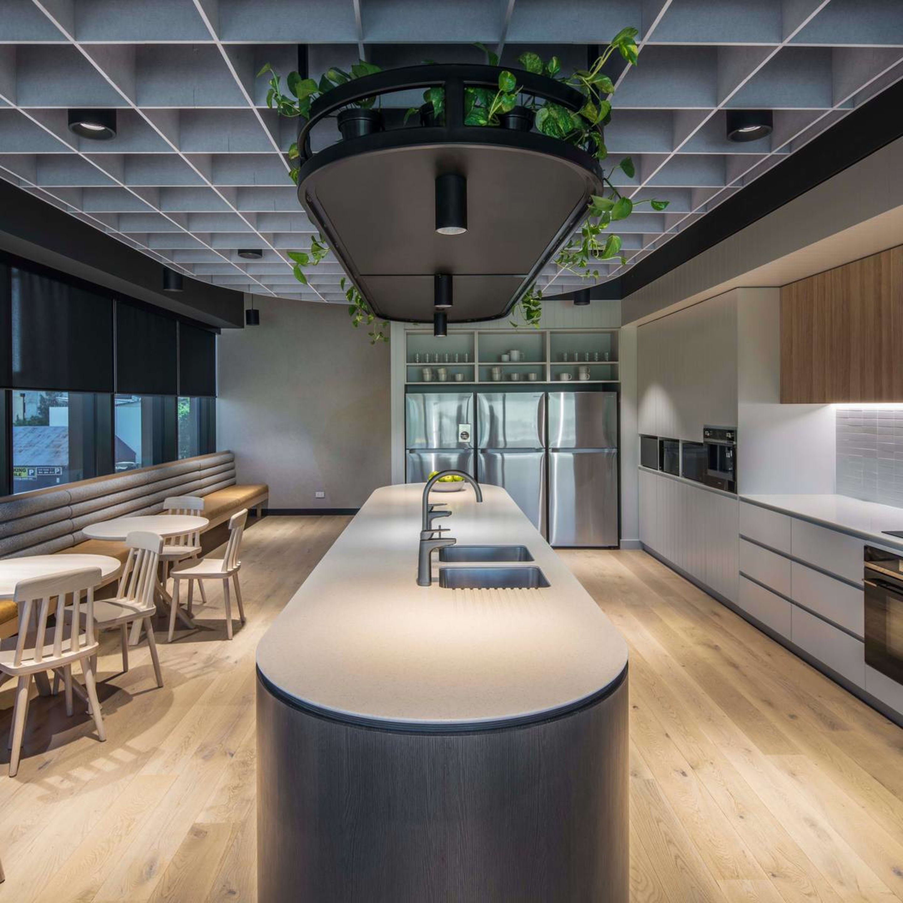 acoustic ceiling in corporate office kitchen with seating area card