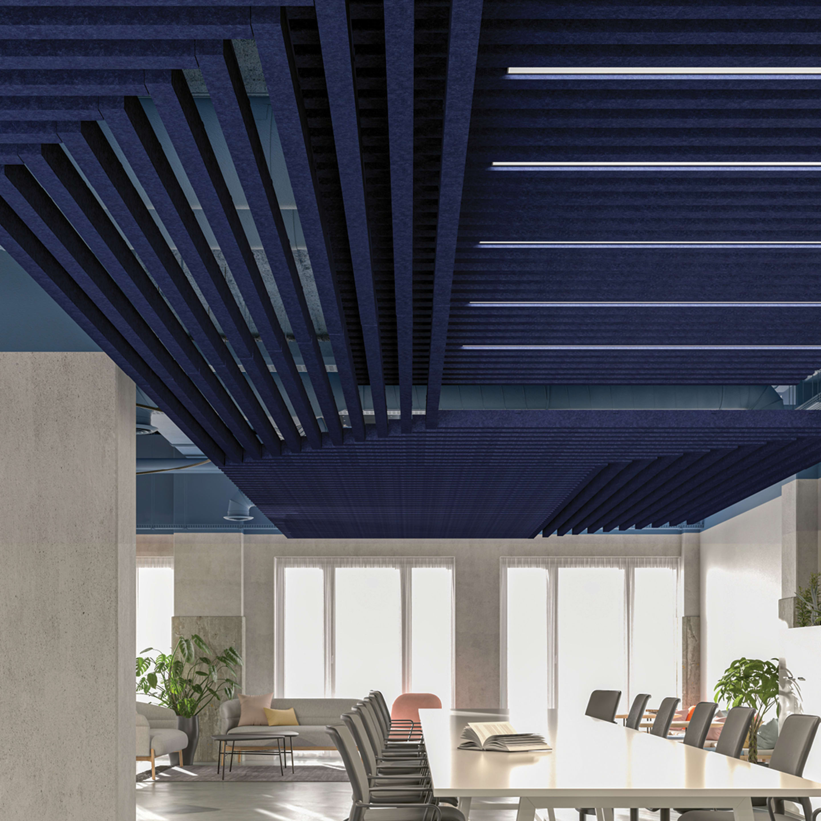 Elevate office design with a pop of color using the Zintra Box Baffles Set in a bold, deep cobalt blue Span layout. This image showcases how these high-performance PET acoustic baffles manage noise and create a dynamic, modern focal point in commercial meeting and breakout areas.