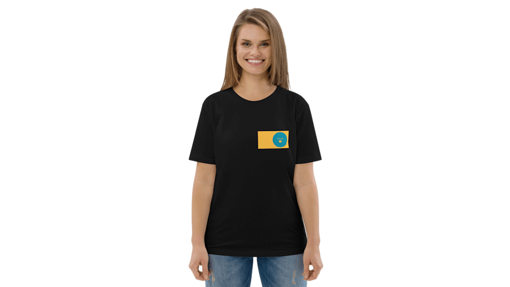 A woman wearing a black shirt that has a yellow and blue circle on it.