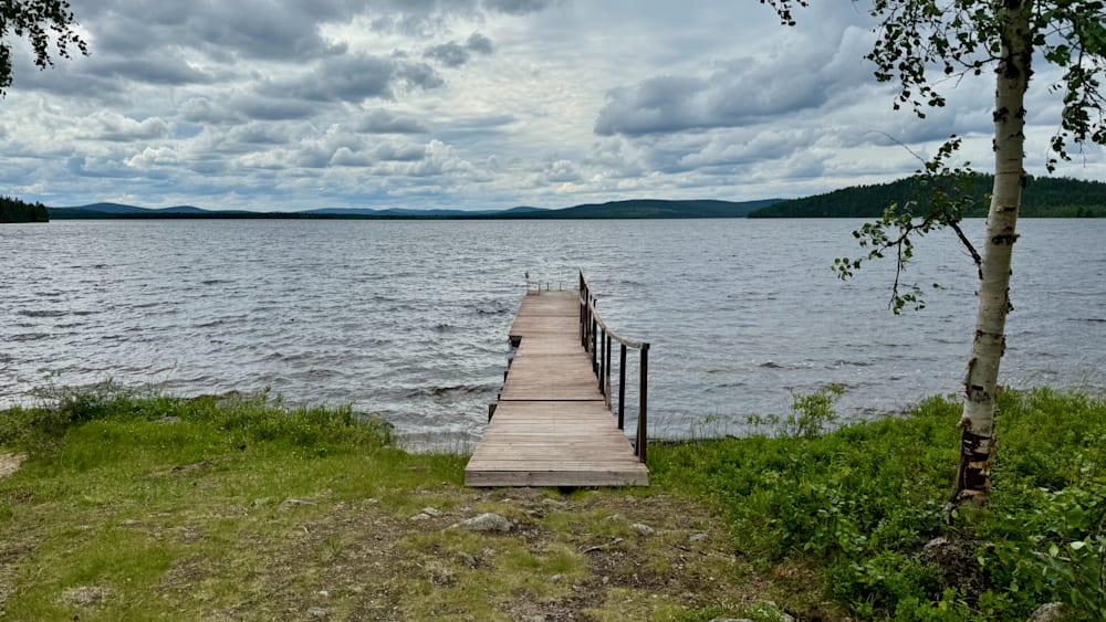 A dock is in front of a large body of water.