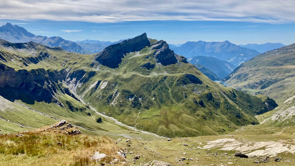 A mountain with a valley between the two peaks.