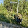 A bike is parked next to a sign that says Tylykuktie.