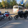 A parked motorcycle with the number 30 on the back of it.