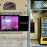 A yellow vending machine with the number 0 on it.