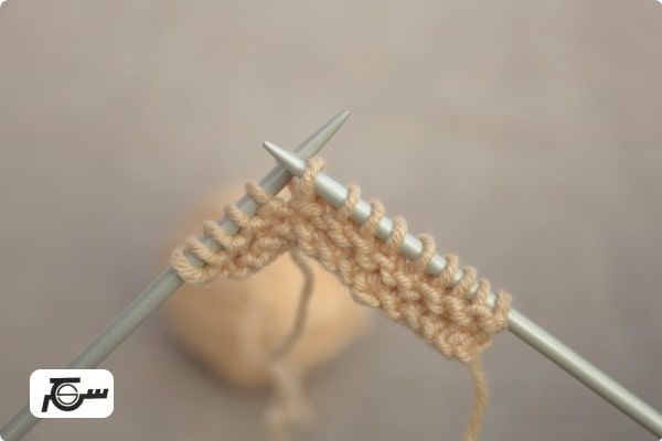 در حال بافندگی با دومیل