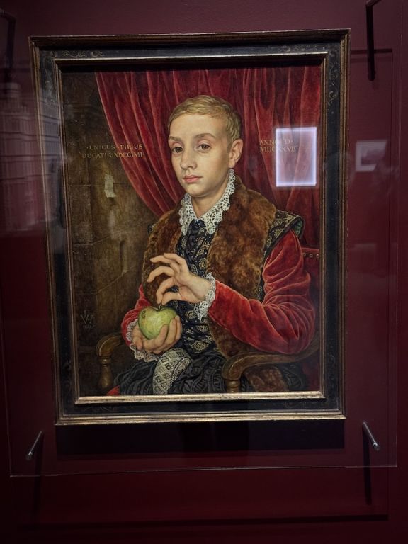 Boy With Apple - a painting of a boy holding an apple