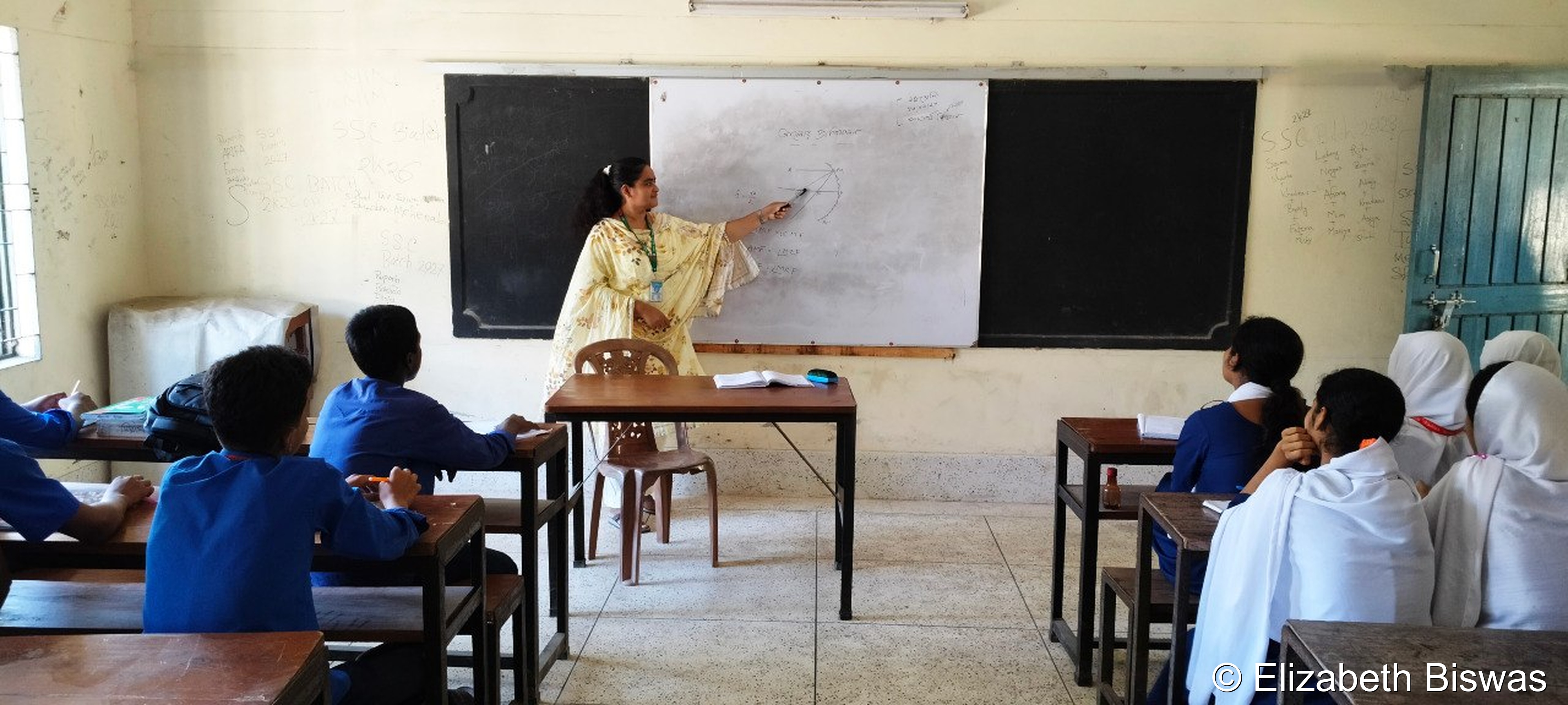 Female Teacher Teaching Science in a Classroom
