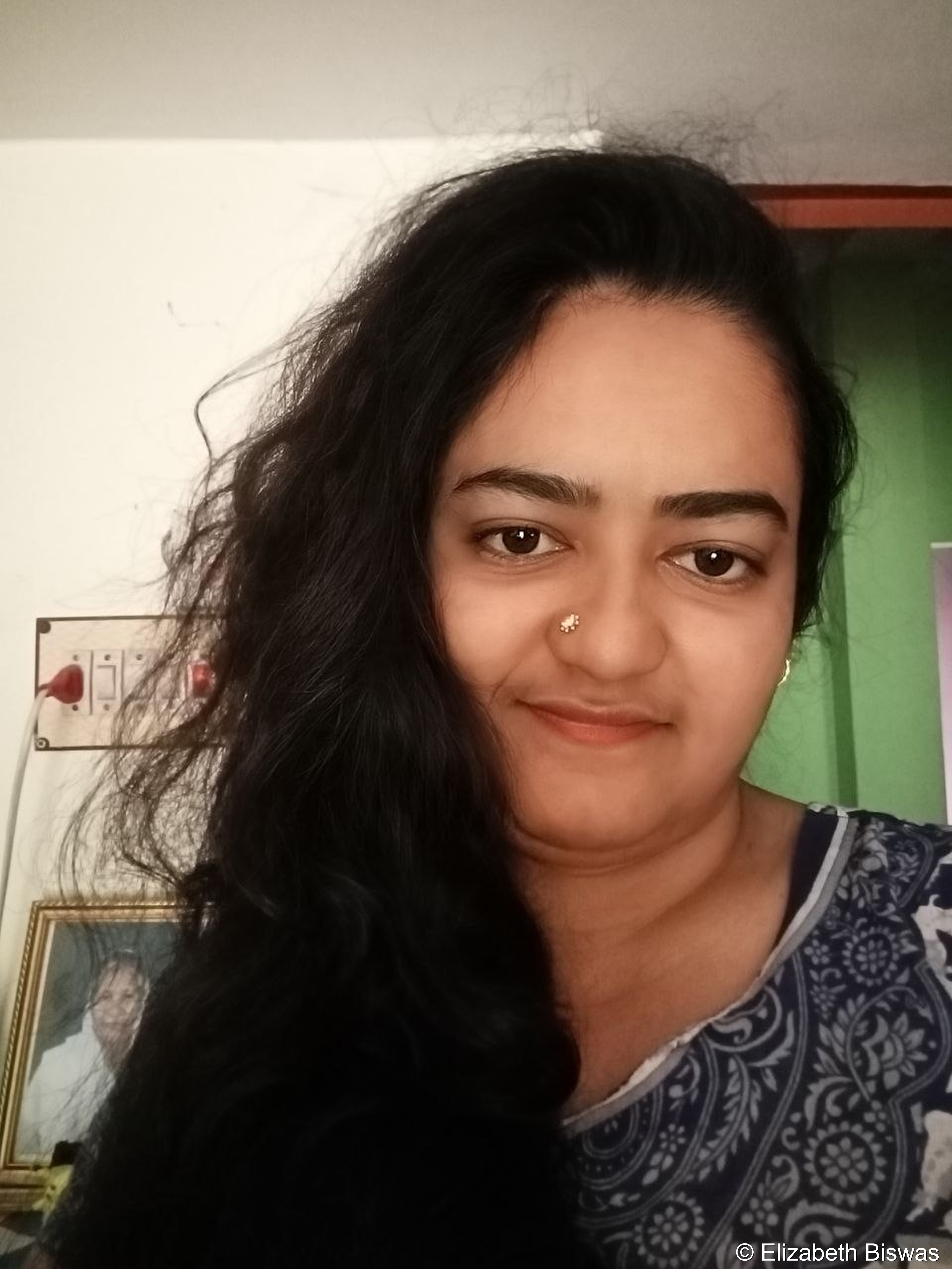 Natural Self Portrait of a Smiling Indian Woman