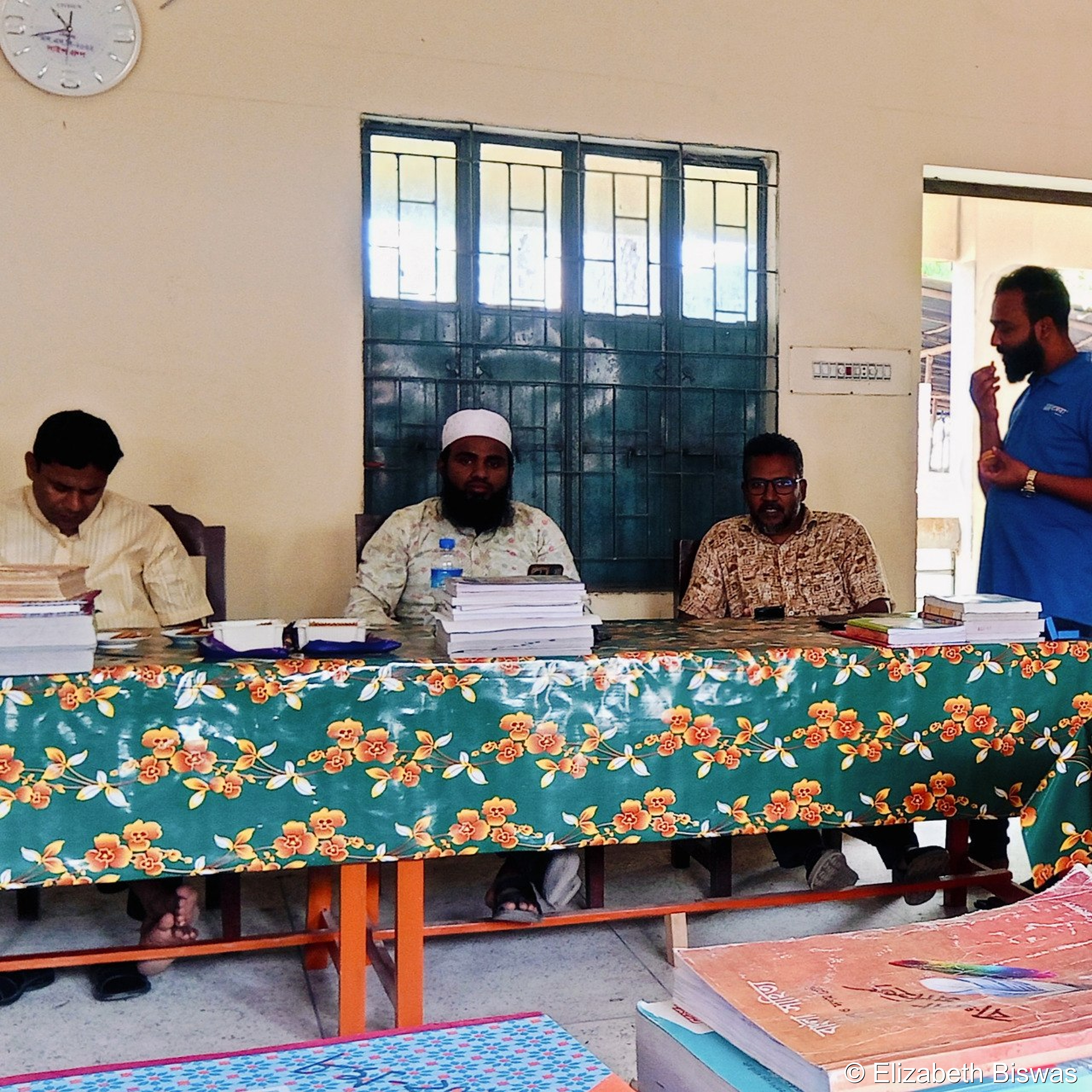 Teachers Meeting and Book Distribution Event