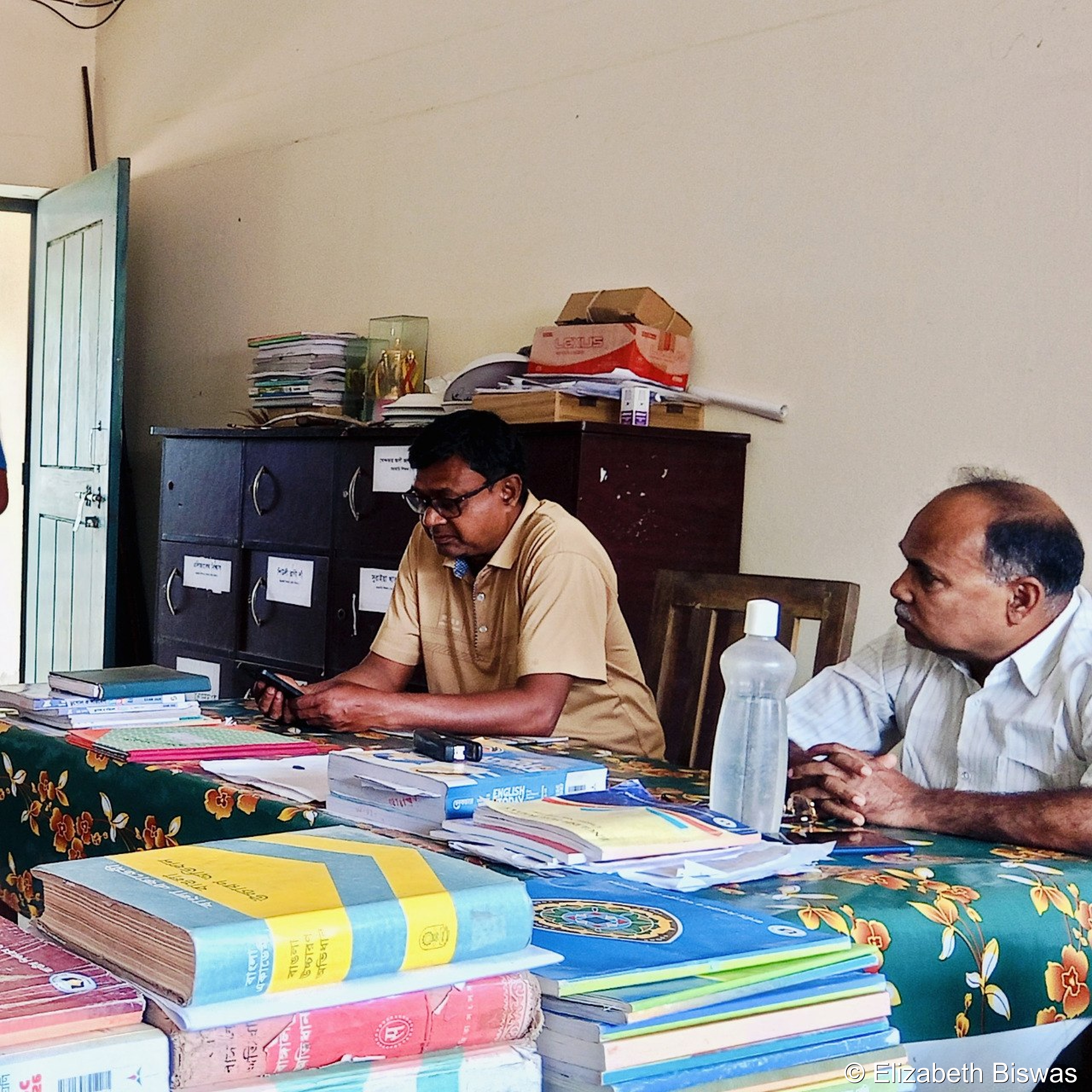 Teachers Meeting in a School Office Setting