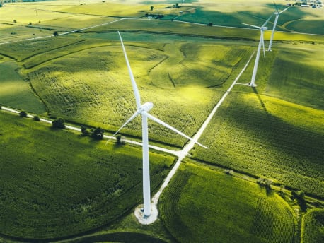Wind turbine on a green field