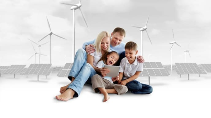 Family in front of a graphic with wind turbine and photovoltaics