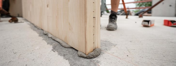 Prefabricated timber wall is installed in shell construction