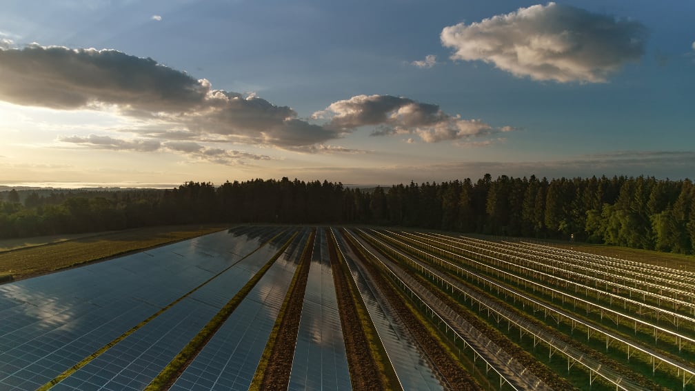 Solar power plant at sunset