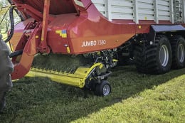 Produktbild: Pöttinger Ladewagen Jumbo mit Mehrzweck-Rotor in Rot-Orange mit gelbem Pickup-Rotor