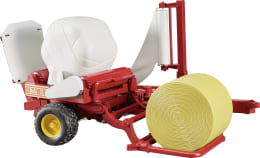 Produktbild: Bruder® Modell McHale Ballenwickler mit schwarzem und ockerbraunem Rundballen 1:16