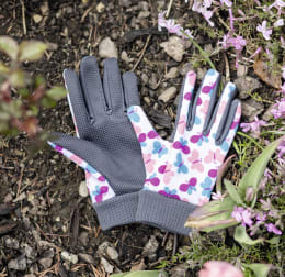 Produktbild: Kinder-Gartenhandschuhe mit buntem Schmetterling-Motiv und grauer Noppen-Innenfläche