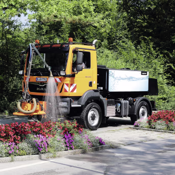 Lifestyle: MAN Systemfahrzeuge 13.290 Baureihe TGM mit Pfannenbett-Wechselsystem und Kommunalhydraulik