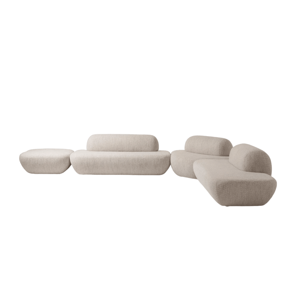 Sofá modular em tecido claro com almofadas e chaise