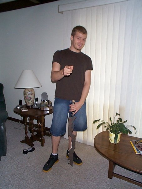 Adam with a sword he made