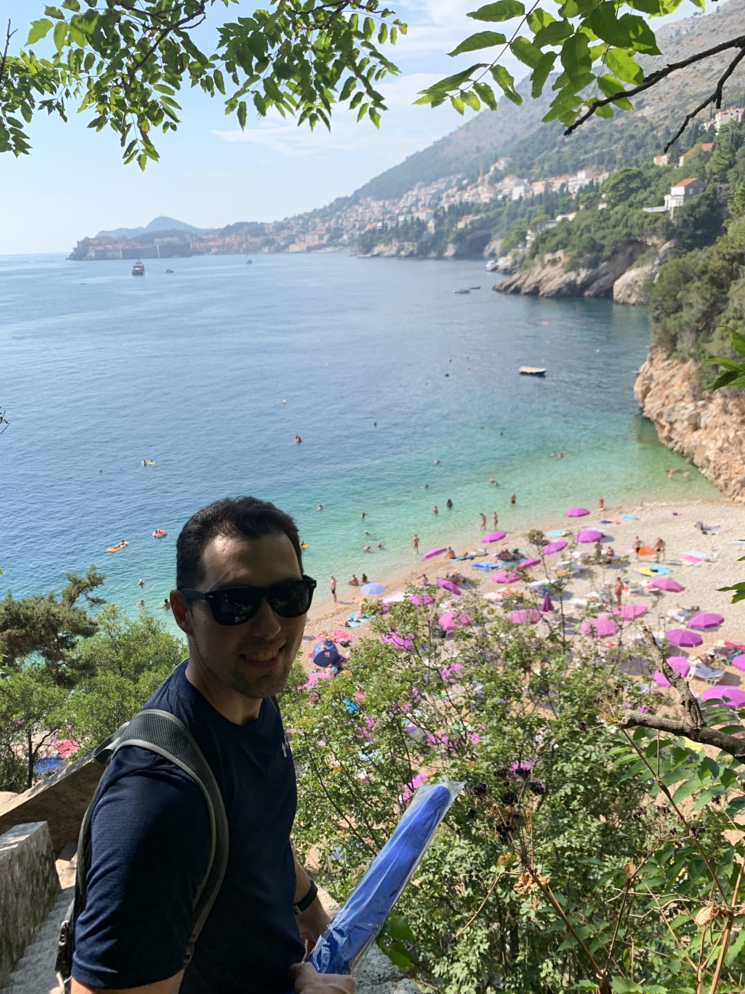 view of a beach from high up on a cliff