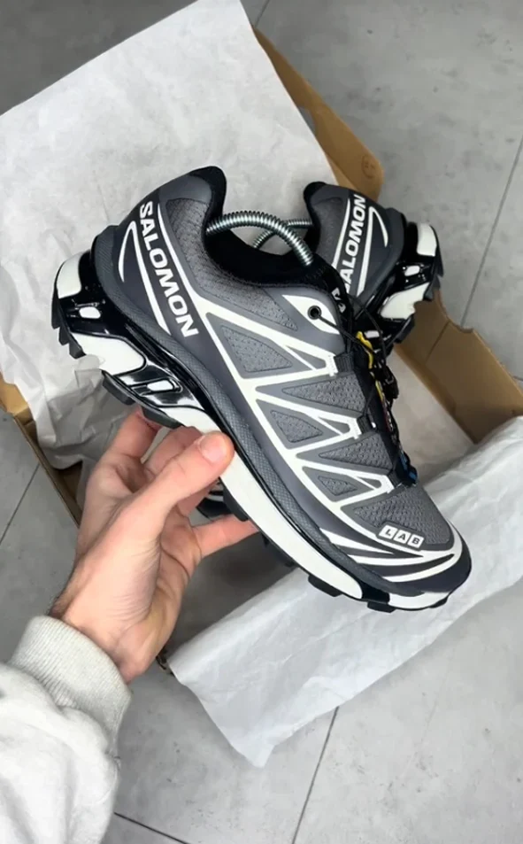 Salomon XT-6 grey and black sneakers, side view with shoebox