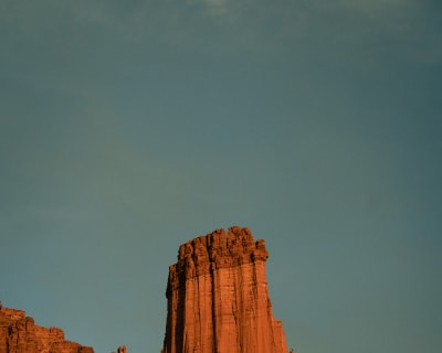 A view of part of Fisher Towers at sunset.