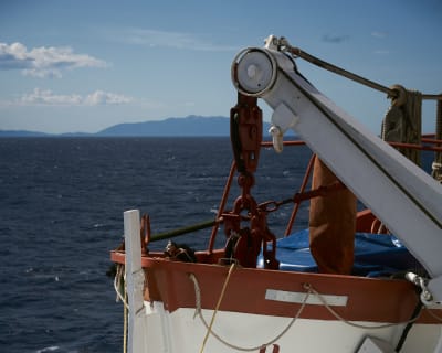 An unused lifeboat stands ready aboard a ferry between Livorno and Corsica