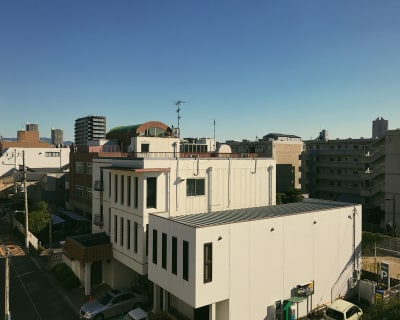 A view from a balcony looking out into Osaka early in the morning.