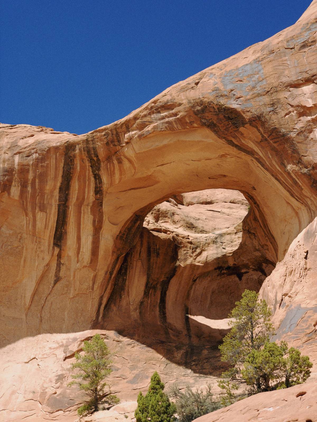 Looking up into one of the cavernous arches in Moab, UT, USA.