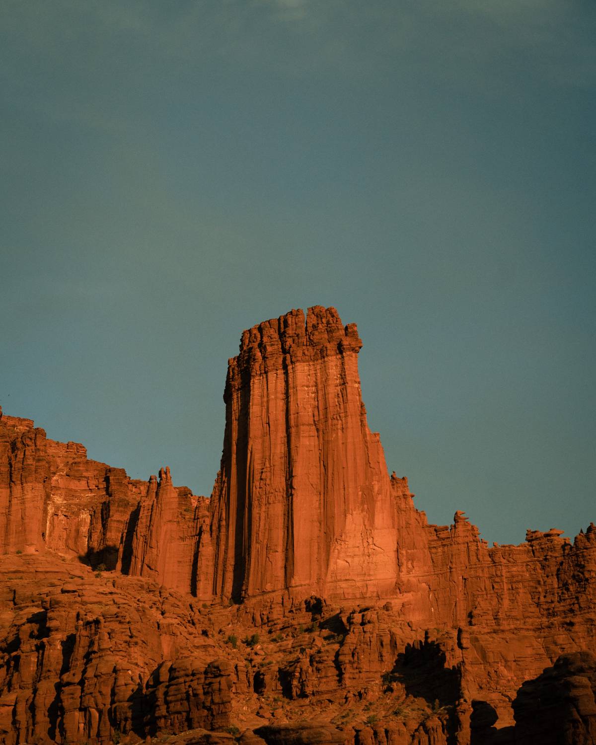 A view of part of Fisher Towers at sunset.