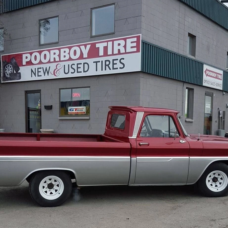 Poorboy Tire logo — tires & wheels in Calgary, Alberta