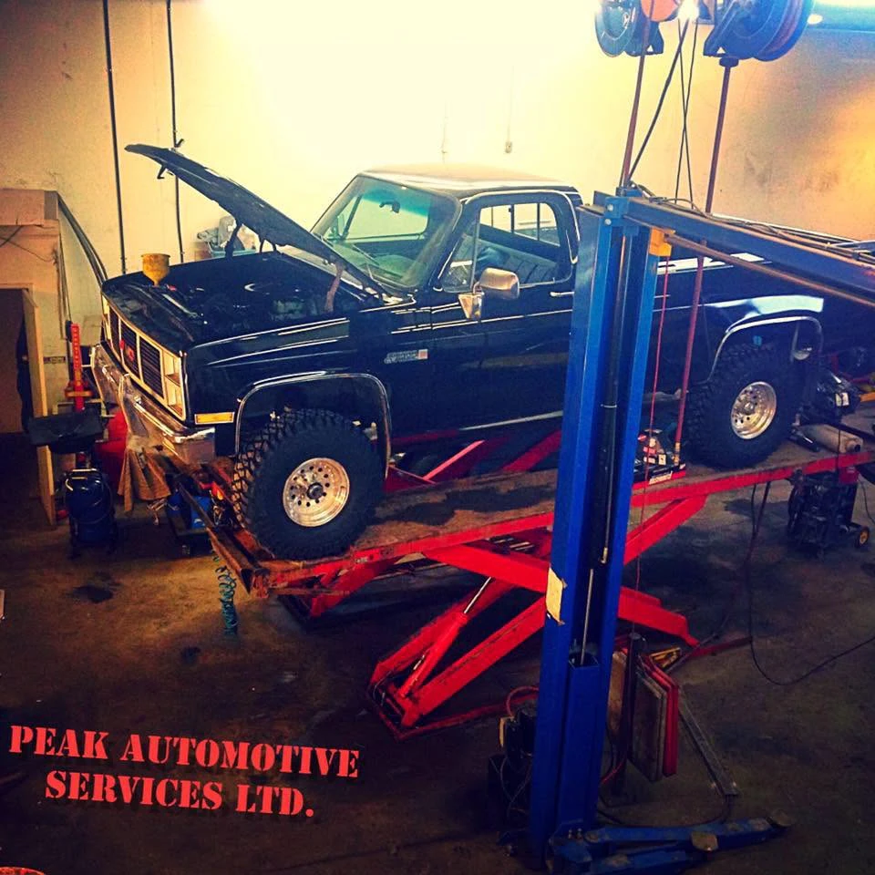 Peak Auto Services logo — tires & wheels in Red Deer, Alberta