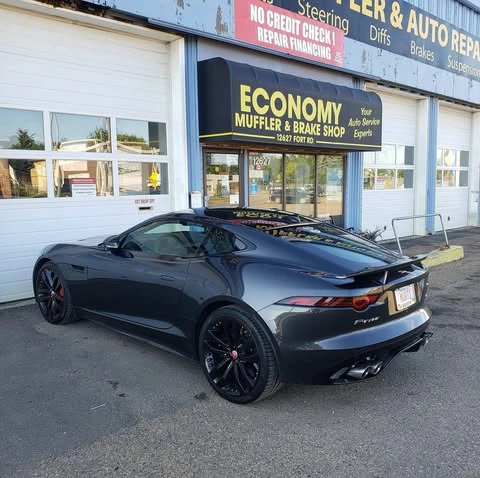 Economy Muffler & Auto Repair logo — tires & wheels in Edmonton, Alberta