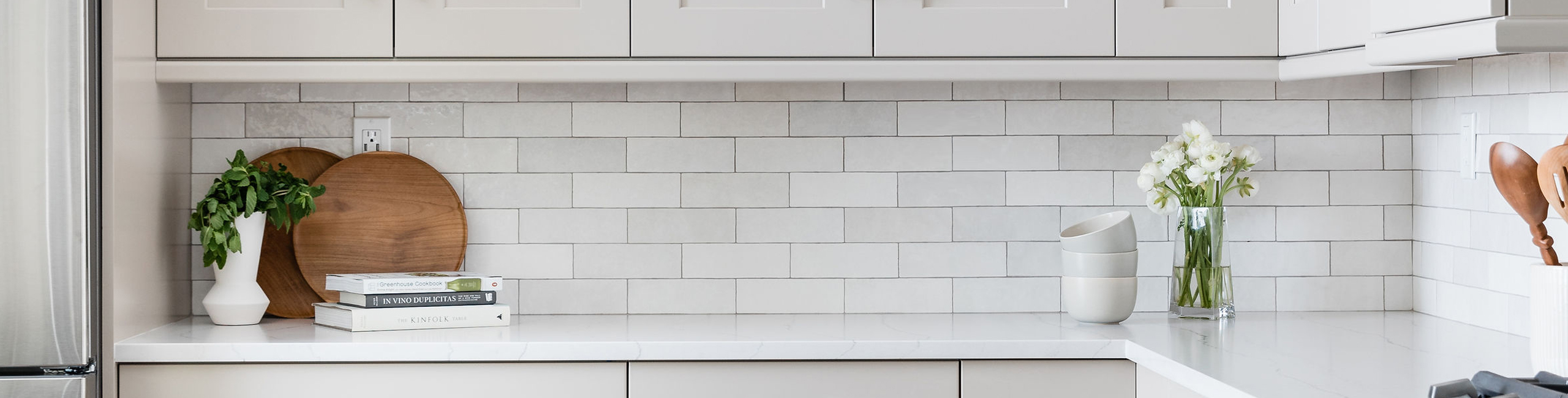 Cloé Ceramic Tile in White with dark grout - designer: Precision Cabinetry & Design, photo: Stephanie Russo