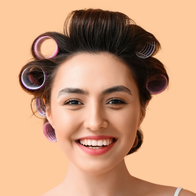 Modelar o cabelo com bobes