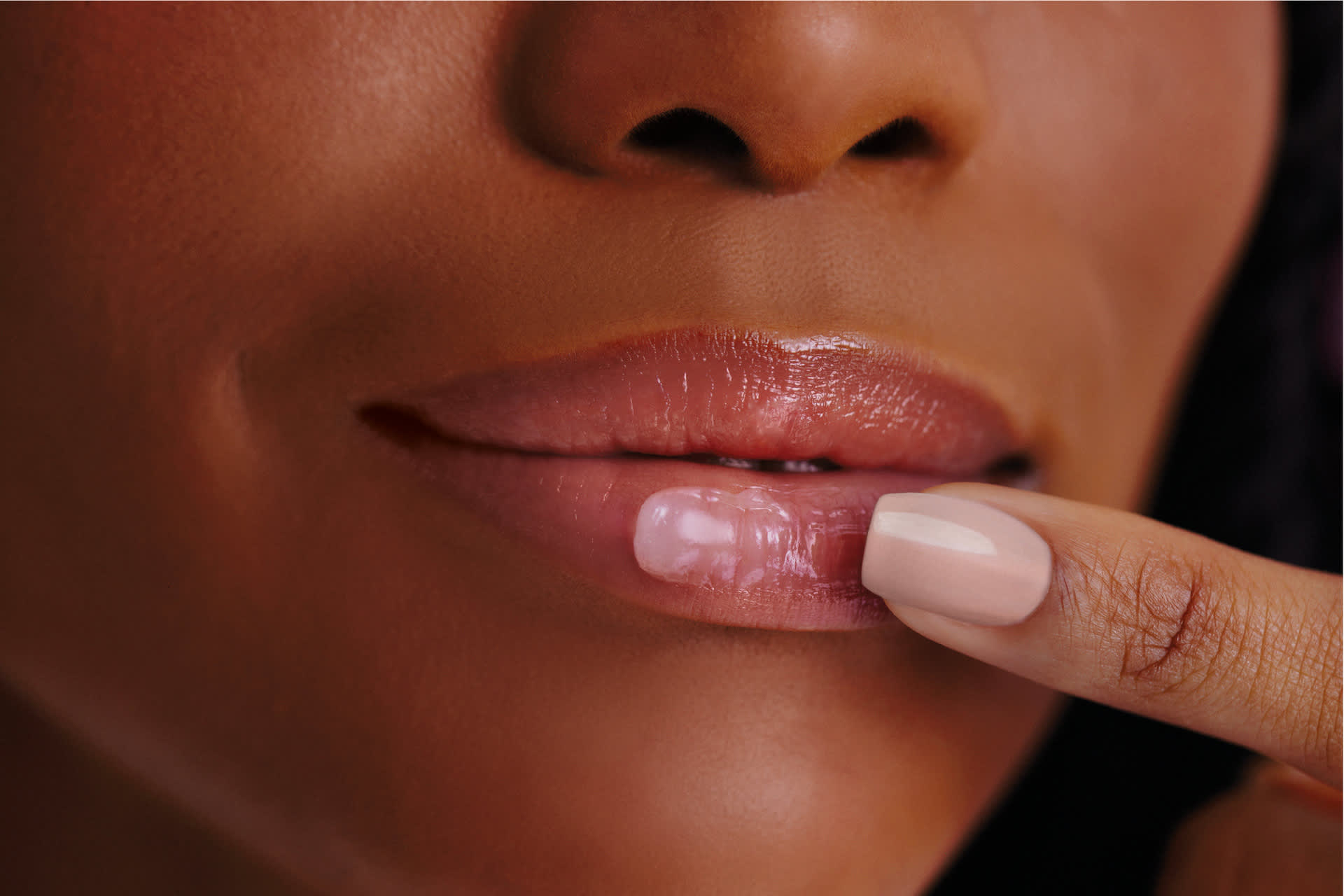 Foco em boca usando balm labial