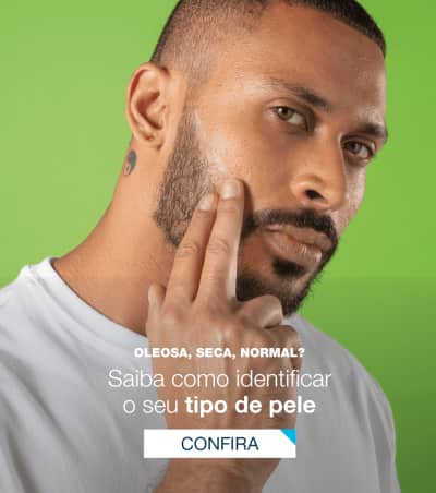 Homem de pele negra com barba, pensativo, em fundo verde. Texto sobre tipos de pele: oleosa, seca, normal.