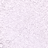 A imagem mostra uma embalagem de pó iluminador cor prateada e no centro, a logo da marca em preto.