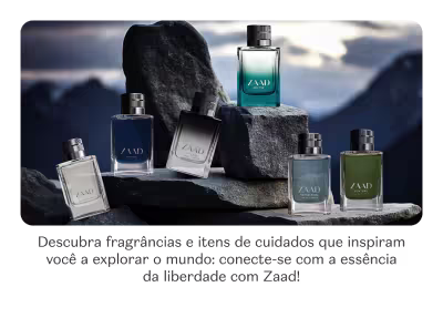 O banner apresenta uma coleção de fragrâncias e itens de cuidados da marca Zaad, em embalagens elegantes e sofisticadas, dispostos sobre rochas em uma paisagem montanhosa.