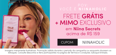 O banner apresenta uma mulher sorrindo e segurando um produto da marca Niina Secrets. O texto destaca uma oferta de frete grátis e mimo exclusivo para compras acima de R$159 nesta marca.