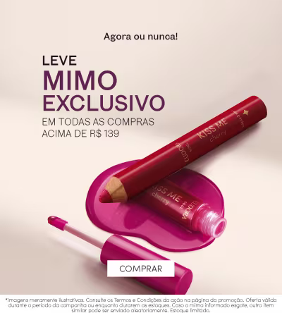 O banner apresenta uma embalagem de um produto cosmético vermelho e rosa, com o texto "Leve mimo exclusivo em todas as compras acima de R$ 139". O produto parece ser um batom ou gloss labial da marca "Kiss me".