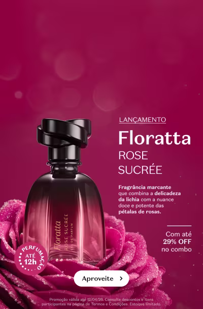 Frasco de vidro com líquido rosa e elementos botânicos em fundo magenta.