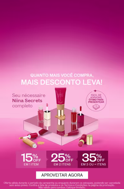 O banner apresenta uma variedade de produtos cosméticos da marca Nina Secrets, incluindo batons, bases e outros itens de maquiagem. O Texto destaca uma oferta progressiva na compra dos itens.