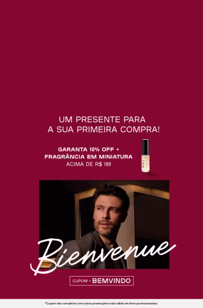 O banner mostra homem em fundo vermelho e oferta de 10% off em fragrância em miniatura acima de R$ 199 para primeira compra.