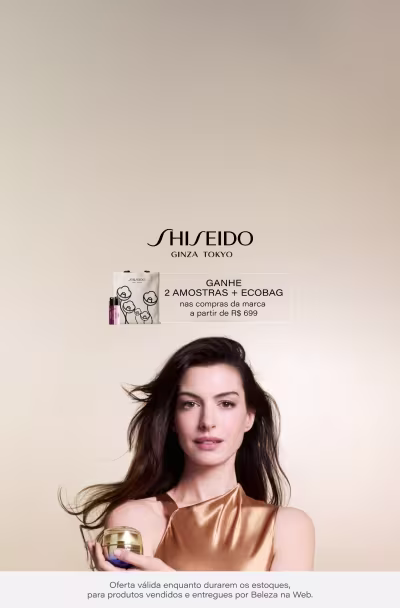 A imagem mostra uma mulher com cabelos escuros e ondulados, vestindo uma blusa dourada, segurando um frasco de produto da marca Shiseido. Abaixo, há uma oferta de 2 amostras + 1 ecobag a partir de R$899,00.