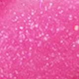 A imagem mostra a tampa da embalagem do gloss, com o aplicador virado pra cima, semelhante a uma tampa de batom, transparente e cilíndrica. Ao lado, o frasco do gloss, com o produto de cor rosa e com a palavra KIND escrito na embalagem.