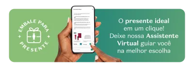 Banner verde que mostra uma mão segurando um celular com a Assistente Virtual. A frase convida a deixar a Assistente Virtual guiar você na melhor escolha.