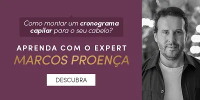 O banner apresenta uma imagem do cabeleireiro Marcos Proença, com a chamada "Aprenda com o expert Marcos Proença" e um botão "Descubra" abaixo. O texto convida o usuário a aprender com Marcos Proença sobre como montar um cronograma capilar para o seu cabelo.
